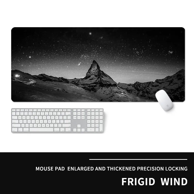 Oversized gaming mouse pad with colourful esports design on natural rubber base, showing extended surface for keyboard and mouse placement