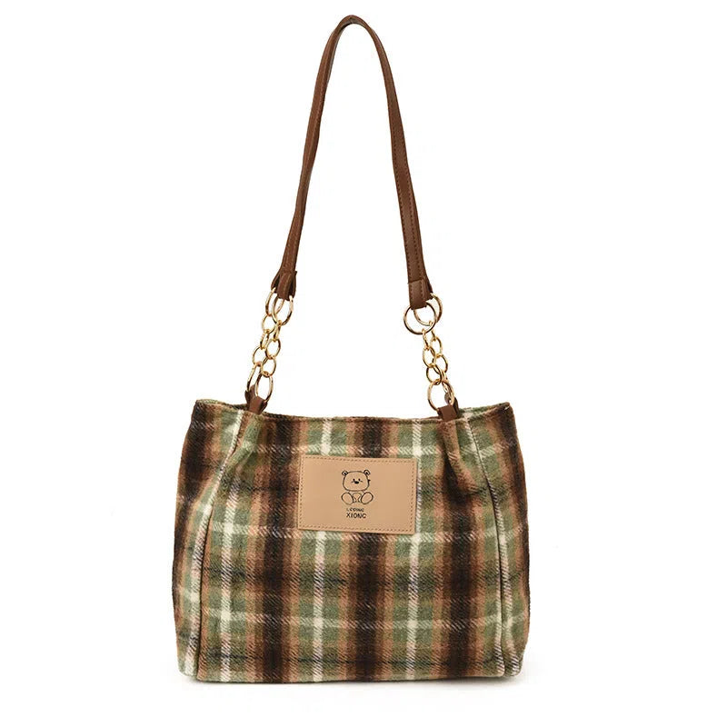Wool plaid women's single-shoulder commuter bag in brown with stitched seam detailing and double straps