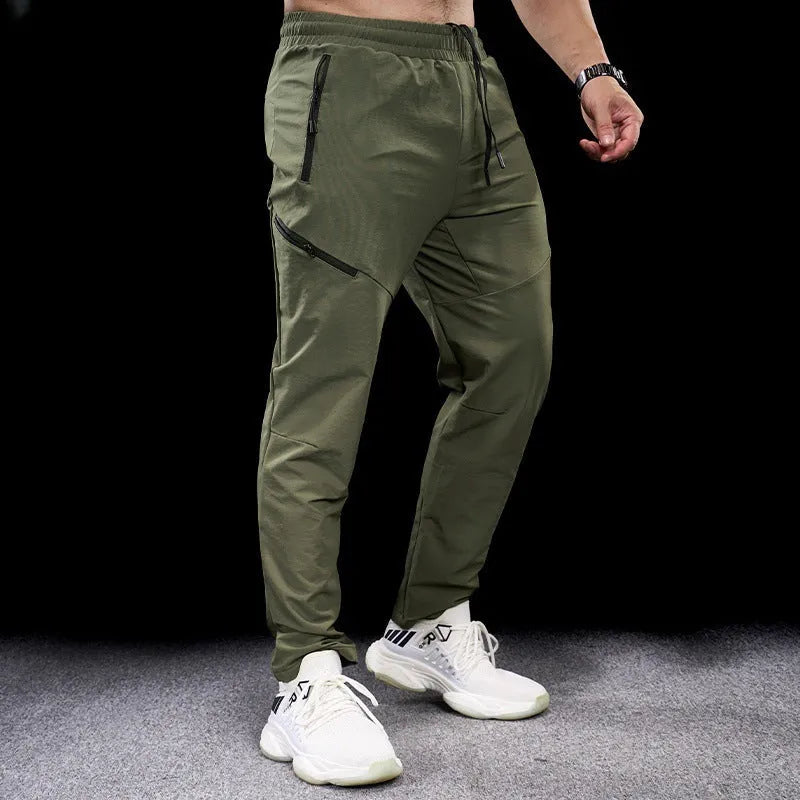 Men's waterproof quick-drying exercise pants in nylon fabric for sports and fitness
