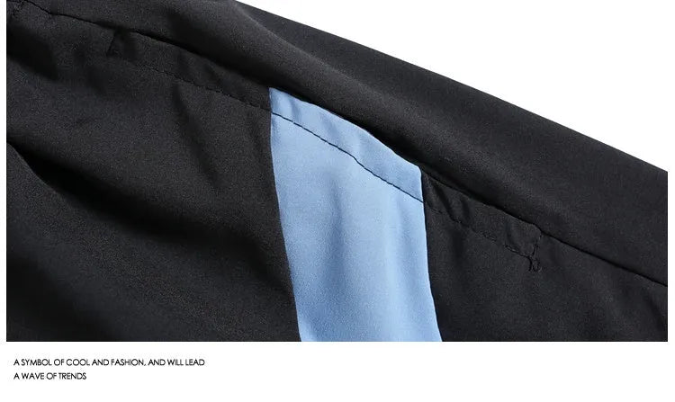 Quick-drying black sports shorts with elastic waistband and straight-leg loose fit for training