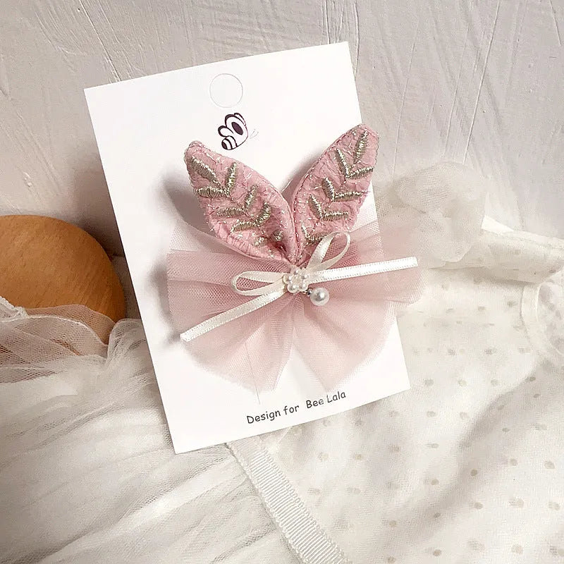 Children's press clip hair accessories set with cloth bows, sequins, pearls, and crystal flowers in pink and beige
