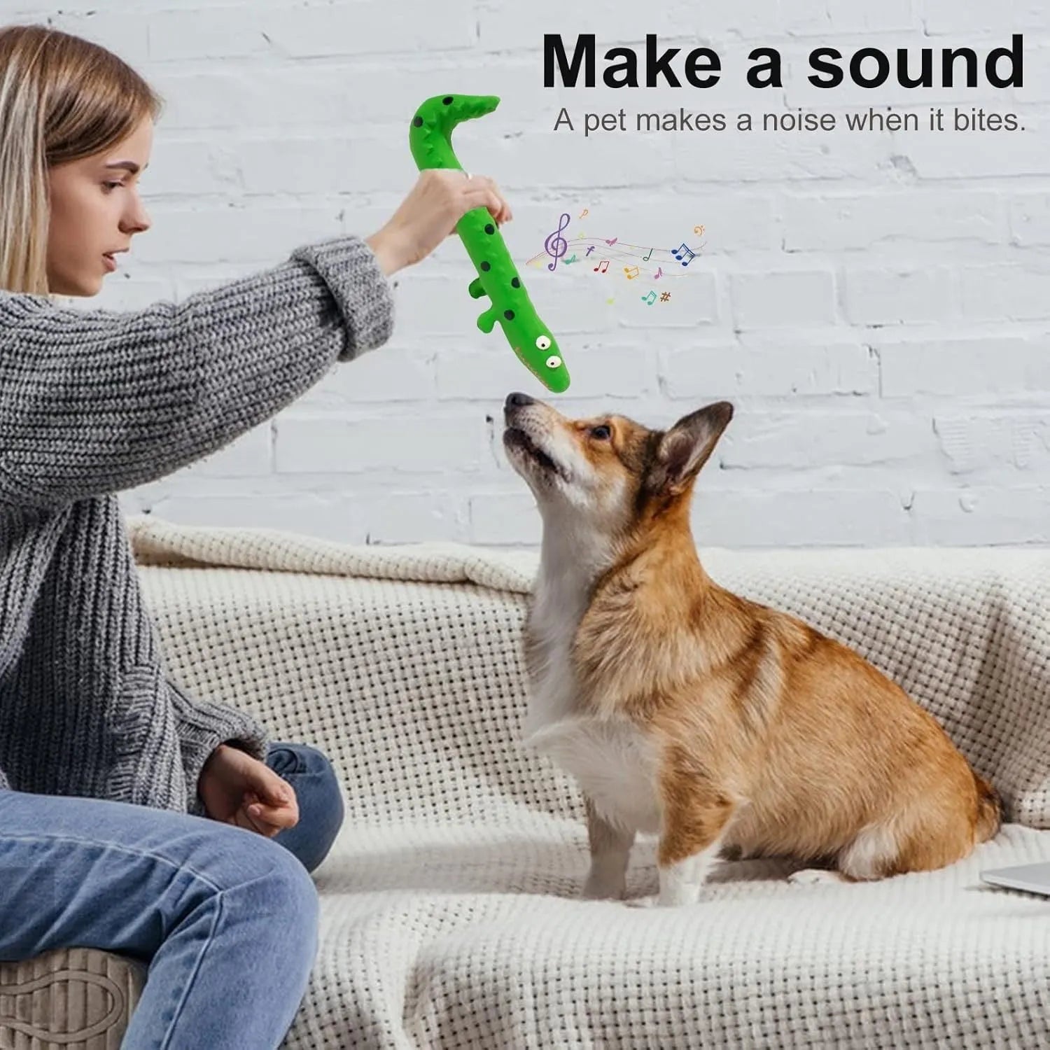 Green lizard-shaped dog chew toy with squeaker for aggressive chewers, shown with dimensions.