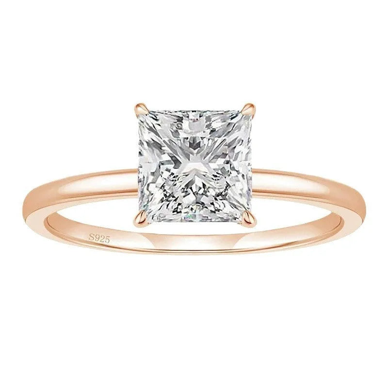A simple geometric 925 sterling silver ring for women, shown in silver, gold, and rose gold colour options on a grey background.