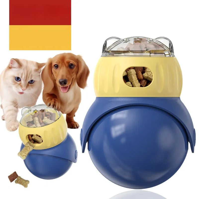 Yellow and blue owl-shaped plastic cat puzzle feeder with a food tumbler mechanism.