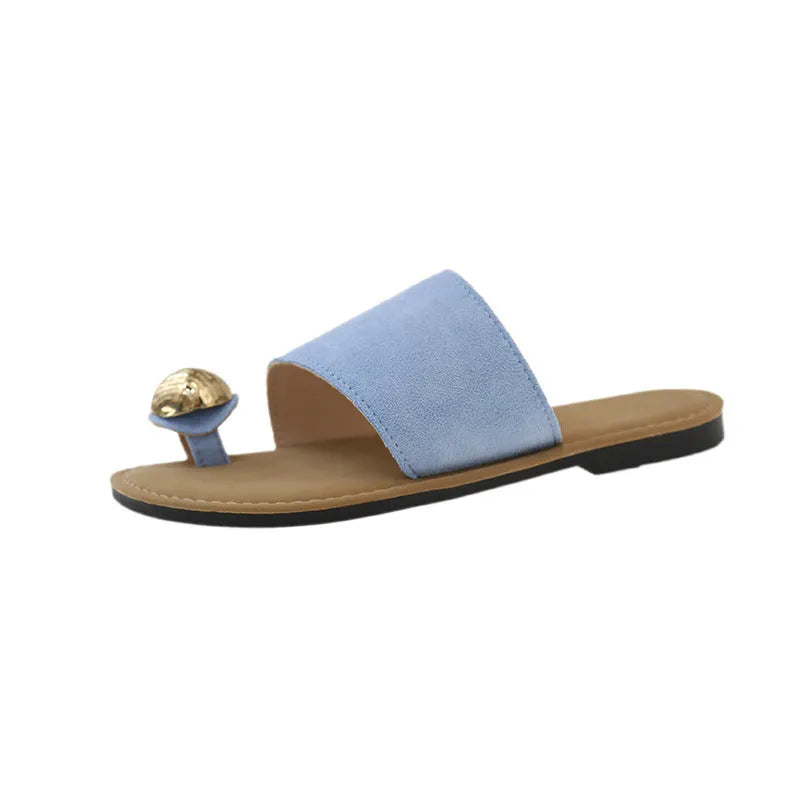 Women's flat bottomed French toe flip flops in solid colours on a light background