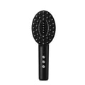 Black rechargeable scalp vibration massage device with multiple therapy heads and charging cable