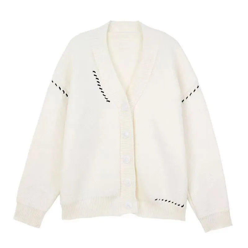 Women's knitted cardigan top coat in black or white with loose fit and long sleeves