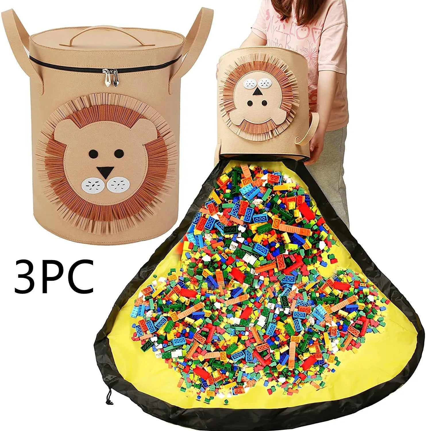 Green felt cube storage bag with pull rope, laid flat as a play mat for toys.