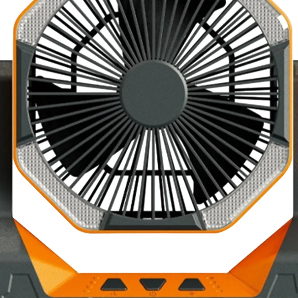 8000mAh telescopic wireless camping fan in orange with aluminium tube, four speeds, and night light on a picnic table