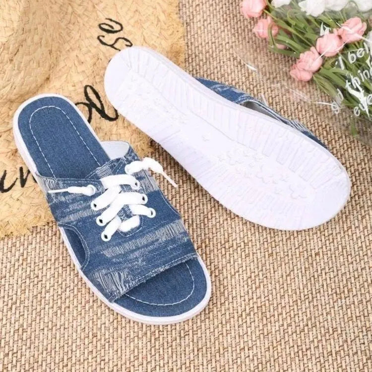 Blue Roman-style women's canvas slippers with cloth lining and rubber sole