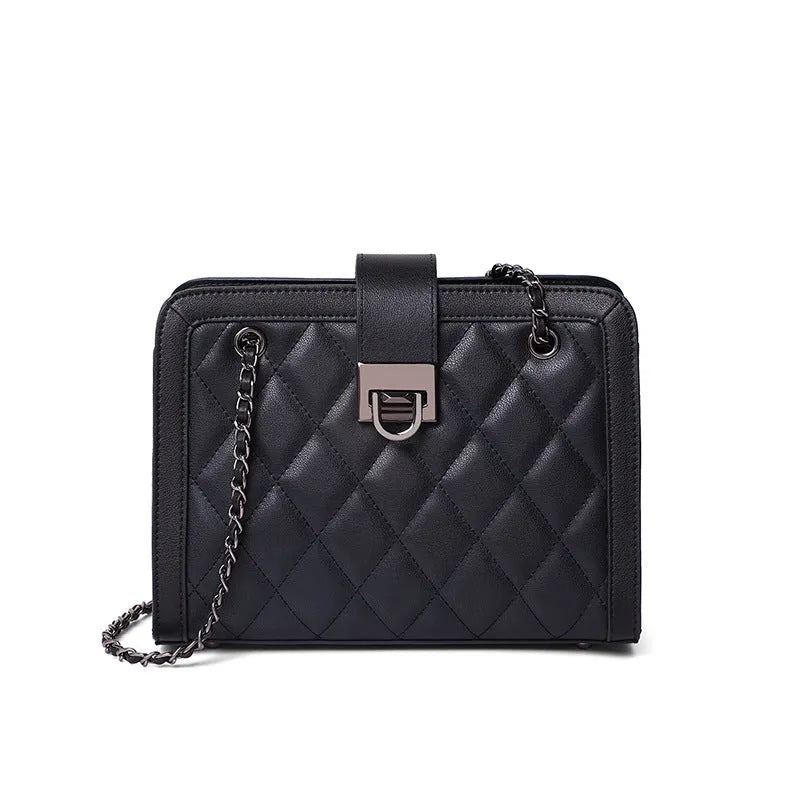 Women's black genuine leather chain crossbody square bag, soft underarm handbag on model