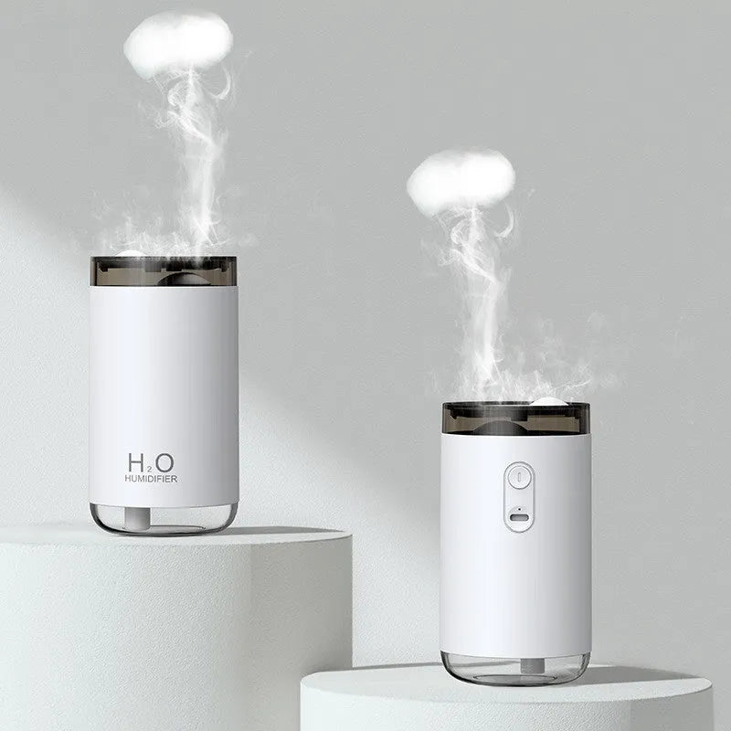 Jellyfish-shaped humidifier emitting smoke ring mist patterns with warm night light glow
