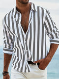 Men's loose-fit striped long-sleeved casual shirt in a light grey colour, showing cardigan style.