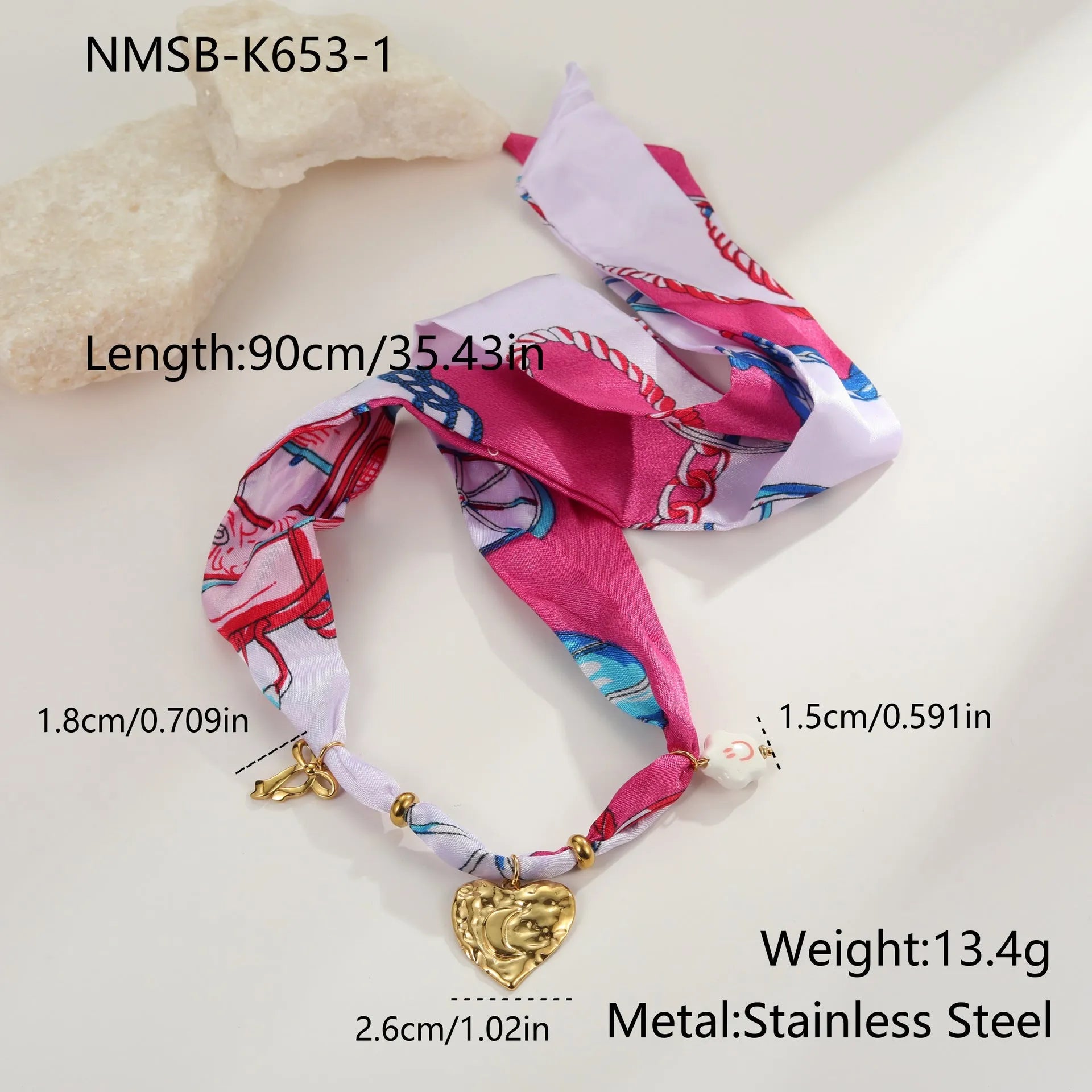 Stainless steel geometric love pendant necklace and matching bracelet set with 18K gold electroplated finish.