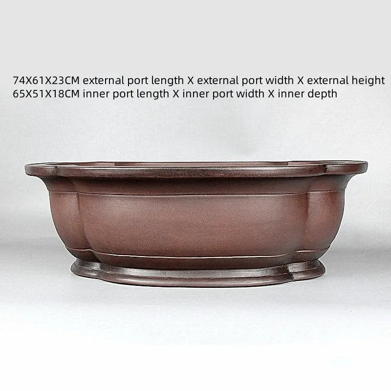 Handmade antique crabapple shaped purple clay flowerpot measuring 74x61x23cm