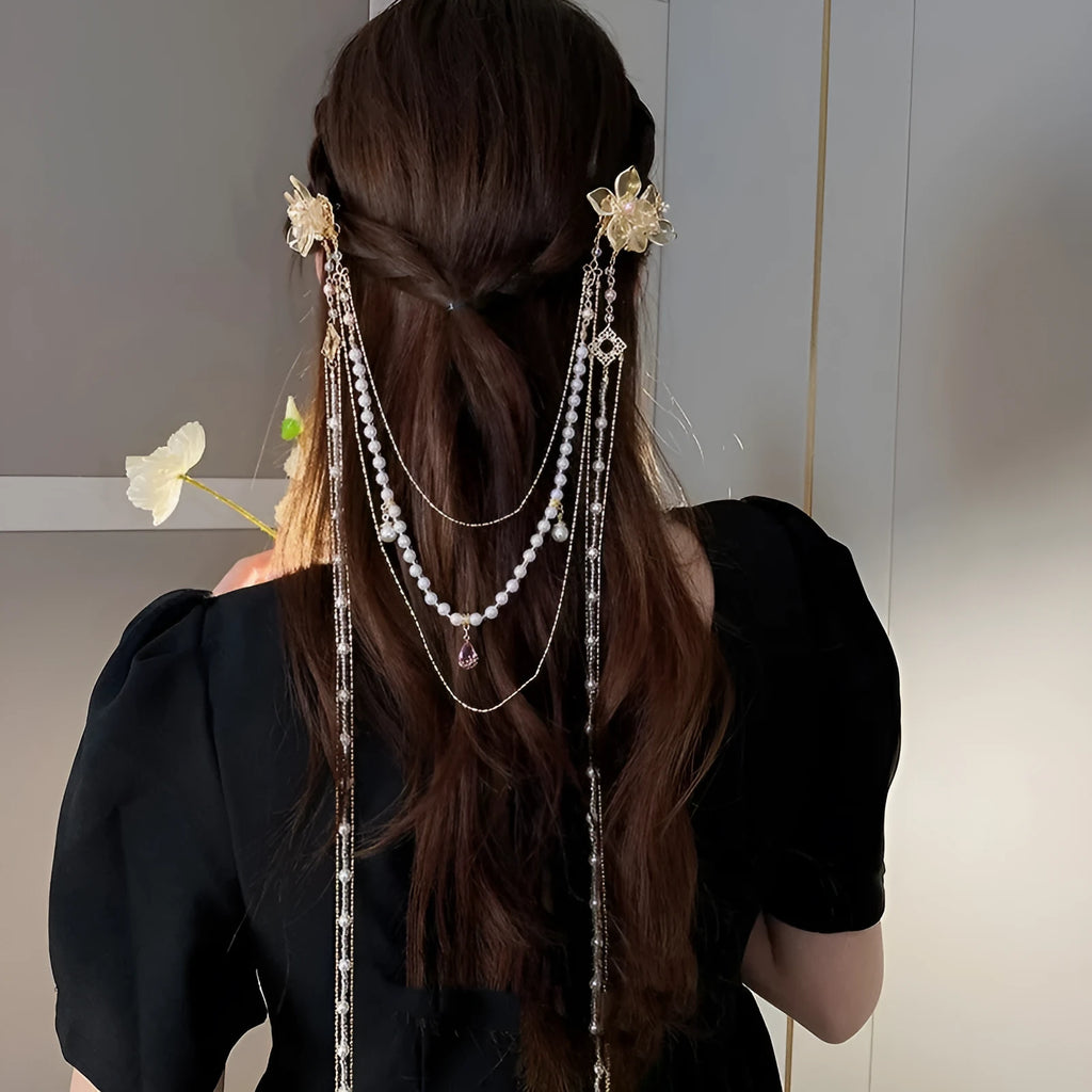 Gold-coloured women's hairpin with pearl diamond flower decoration and tassel detail