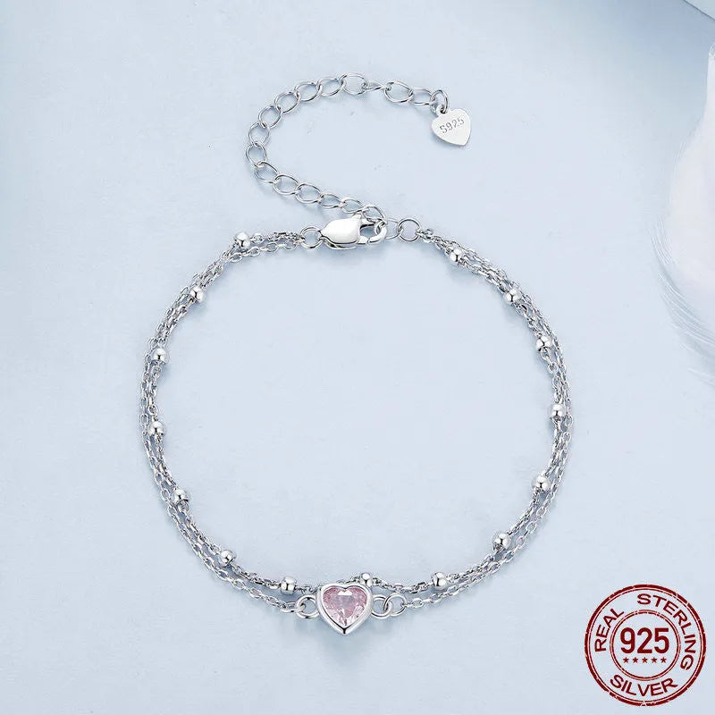 Sweet girlish style 925 sterling silver bracelet with a small heart-shaped pendant on an adjustable chain.