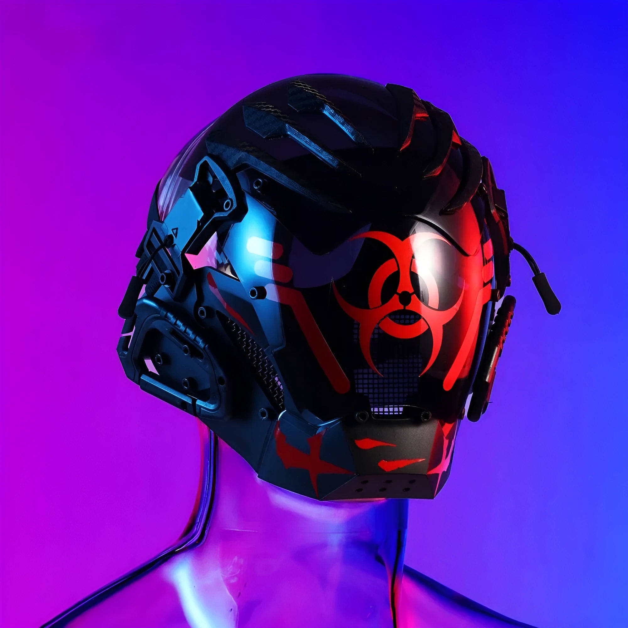 Black full-face cybernetic prop helmet with sci-fi design on a model or stand.