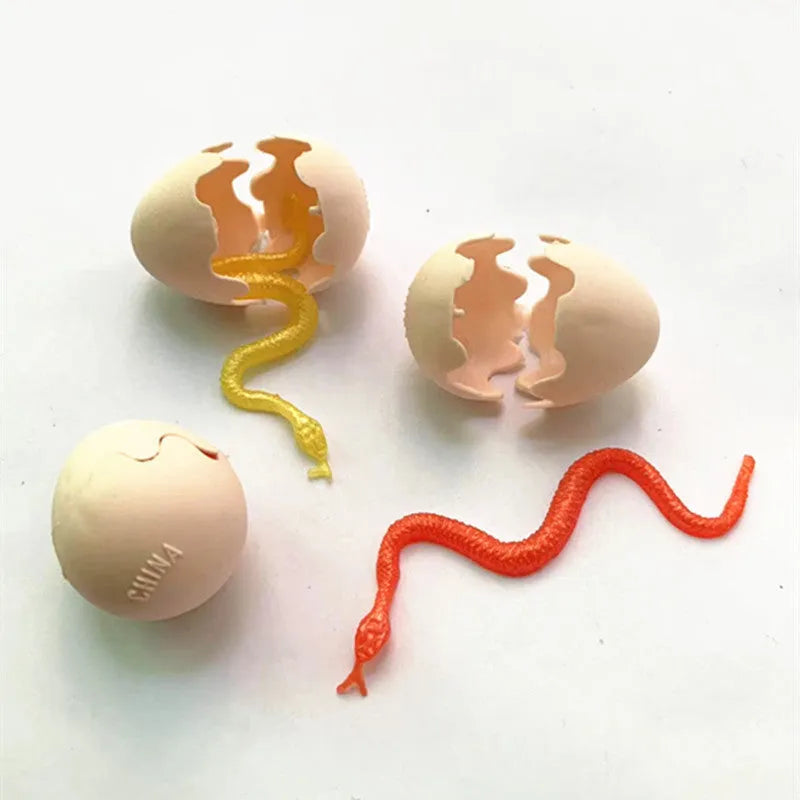 Fake snake egg toy Halloween prank plastic egg 3x3.8cm with stretchable snake 10x1cm