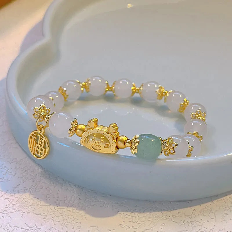 Women's floral glazed zodiac animal bracelet with colourful glass beads and electroplated metal details