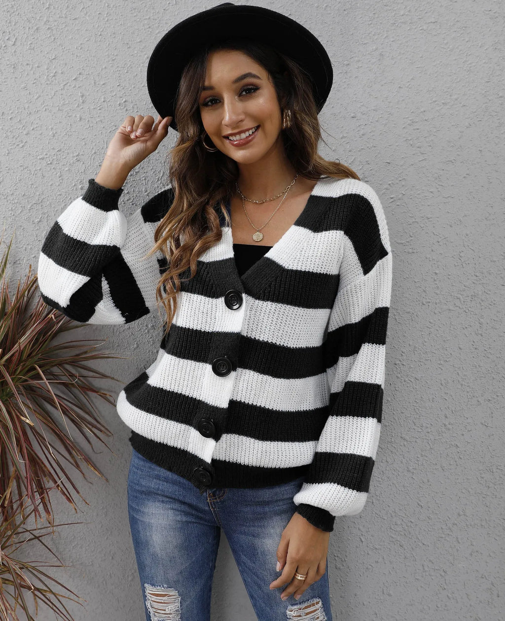 Women's striped button cardigan in deer plush polyester fabric, shown in dark green colour.
