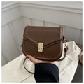 Soft PU leather clamshell messenger bag in horizontal square design shown in available colours.