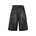 Man wearing distressed light blue denim shorts with raw edge hem and straight hip hop cut.