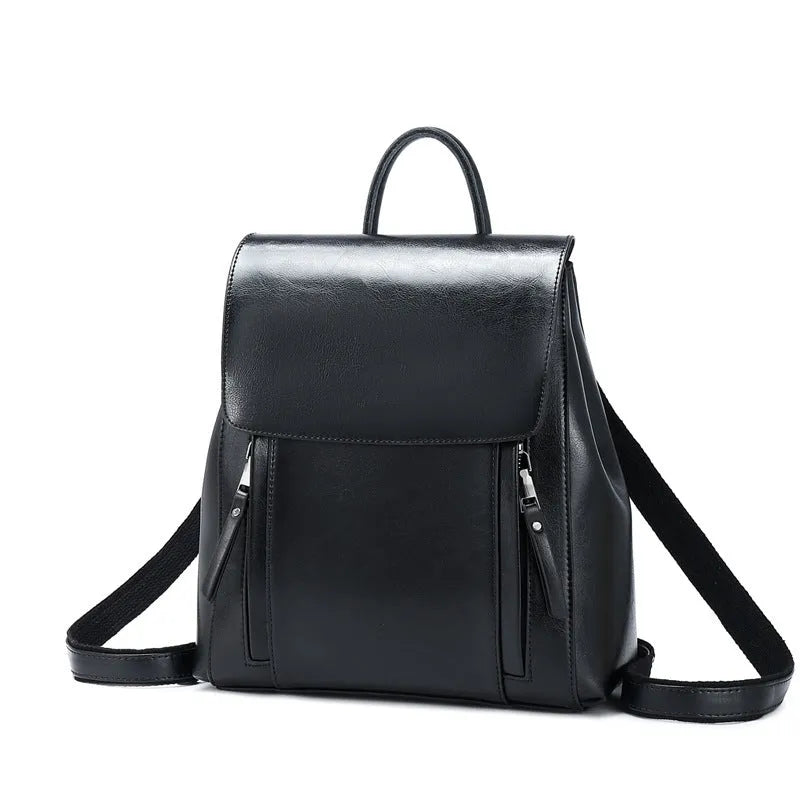 Genuine leather women's backpack in oil-wax cowhide with multiple internal pockets and compartments