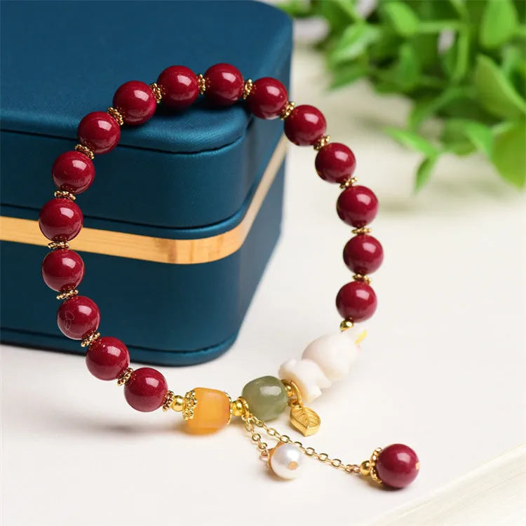 Natural cinnabar rabbit bracelet for women in national style, shown in 8mm and 10mm size options.