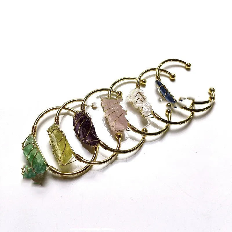Natural rough crystal bracelet with gold wire winding in geometric bohemian design