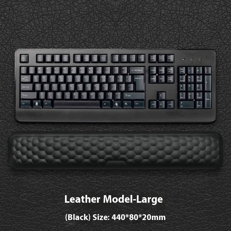 Memory foam mouse wrist rest with silicone base in black cloth and grey leather style options.