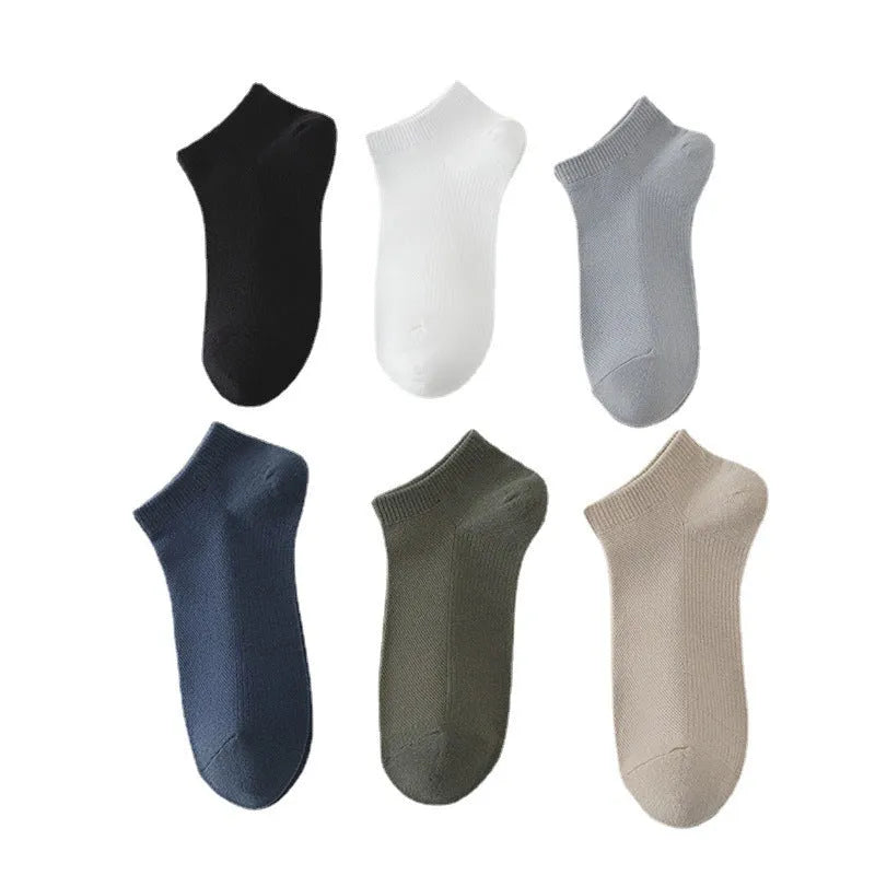 Solid colour low-cut boat socks for men made from polyester, shown in one of six available colours.