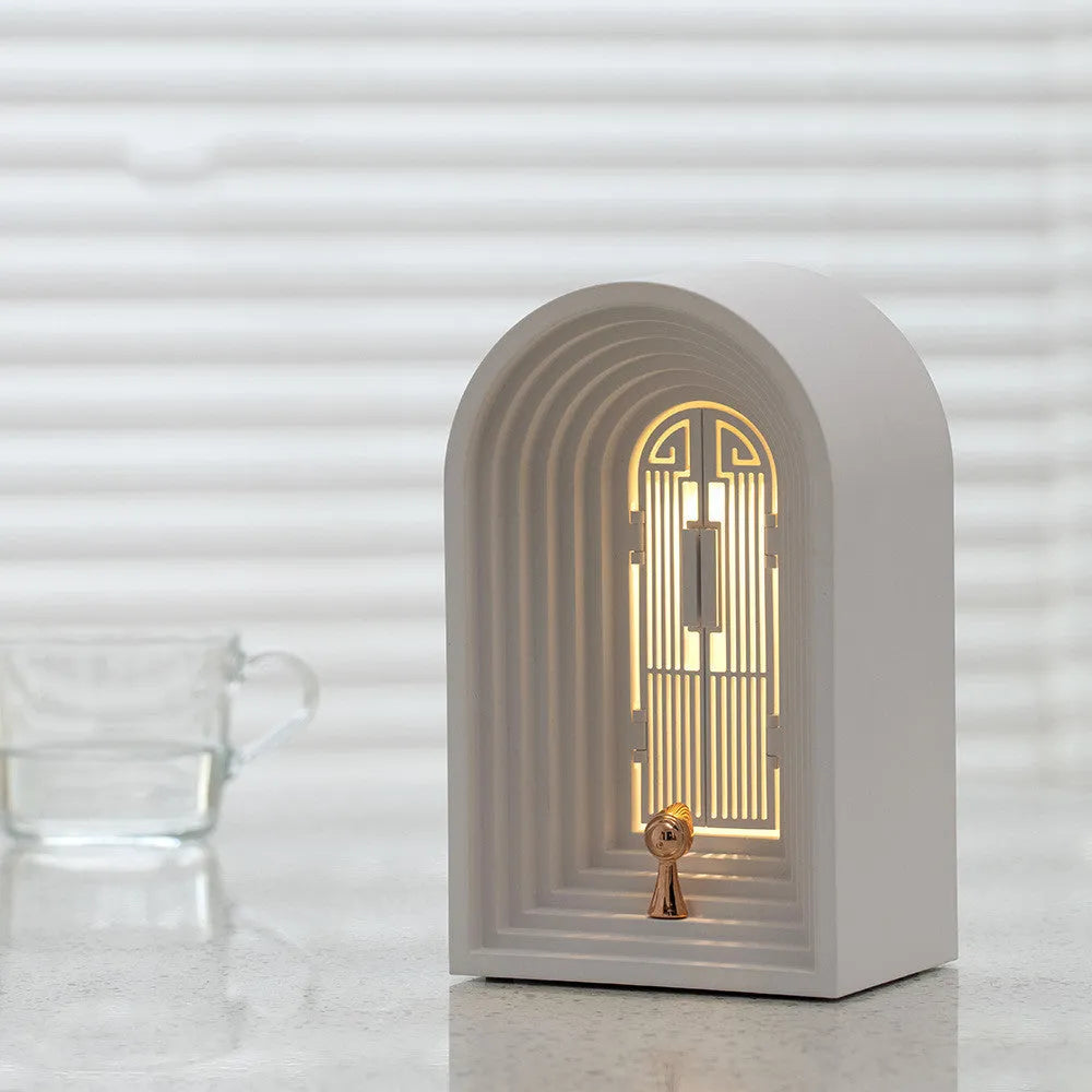 Nordic LED table lamp with Bluetooth speaker in white, plastic shade, compact bedside design