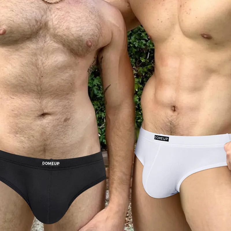Men's seamless low waist briefs in black, white, or pink with hip-lifting function