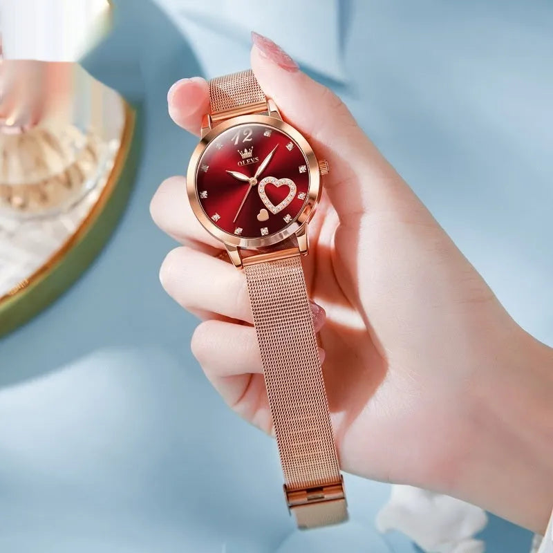 Women's rose shell case fashion watch with mesh strap, showing multiple dial colour options.