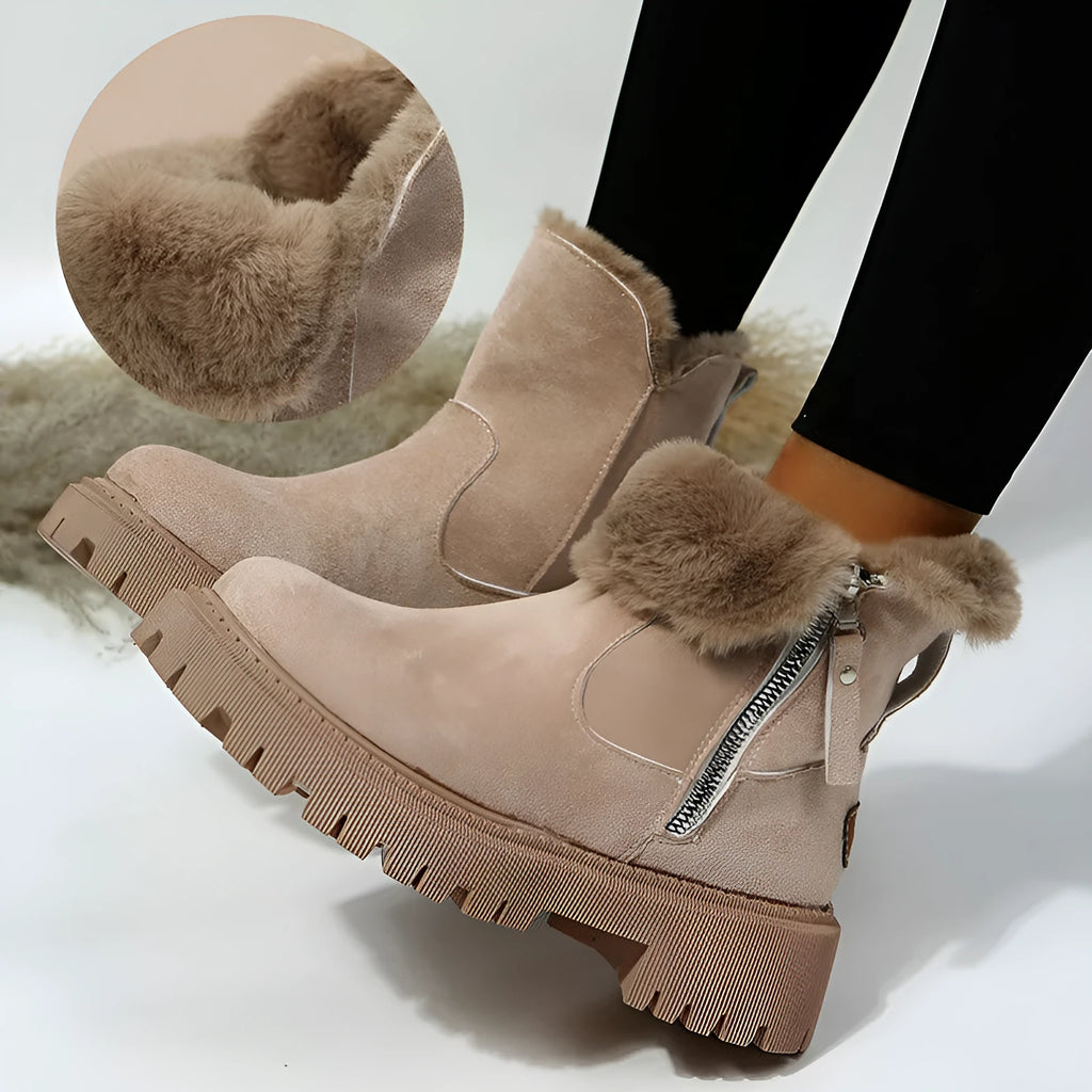 Women's black thick plush high top snow boots with side zipper and round toe on a rubber sole.