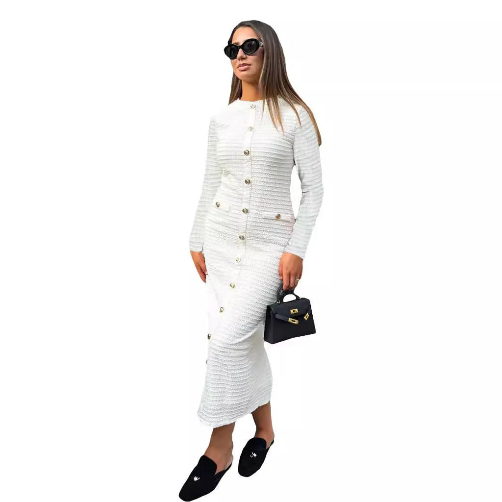 French retro slim fit knitted long-sleeved dress in black shown on a model.