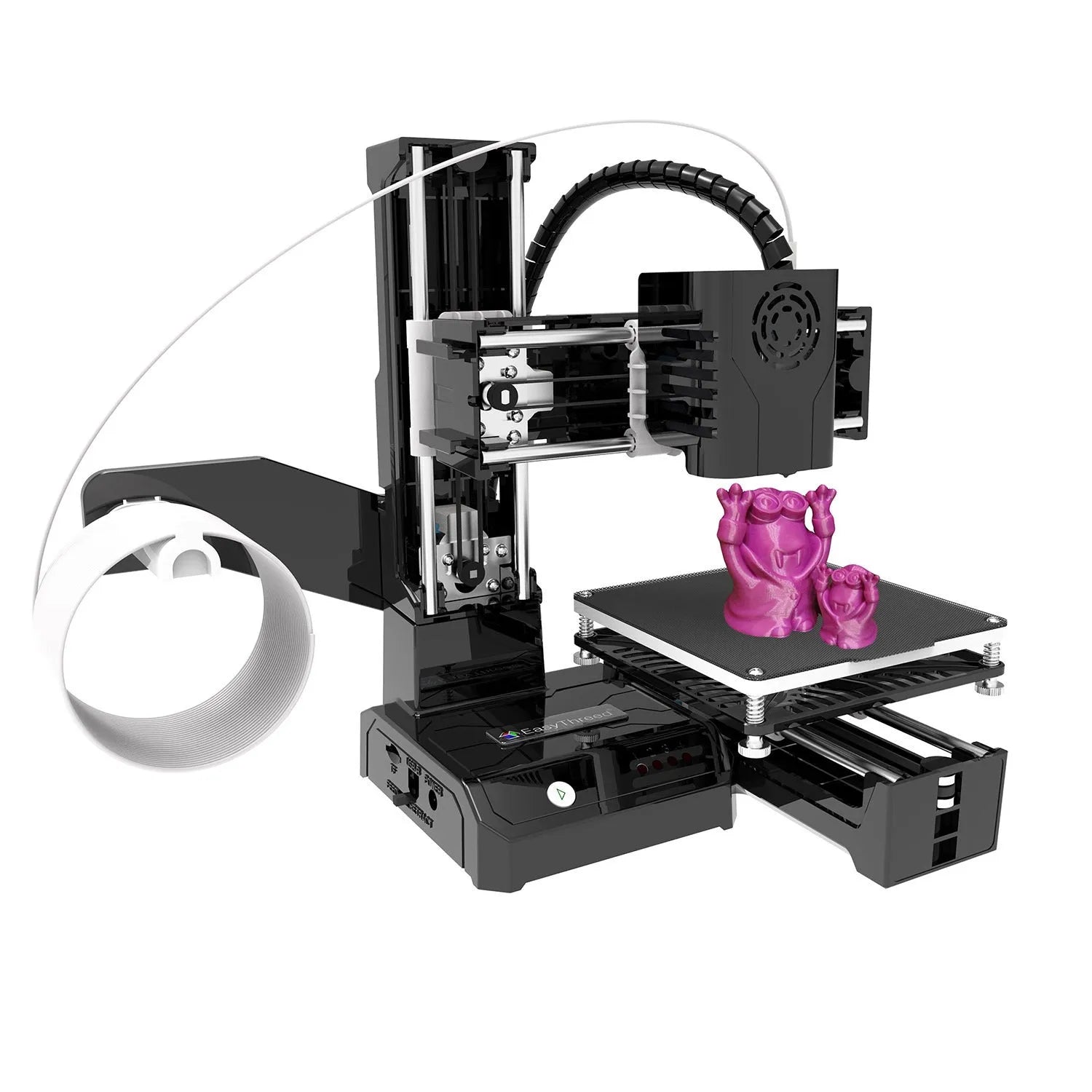 K9 New Mini desktop 3D printer on a table, showing its compact size and build plate.