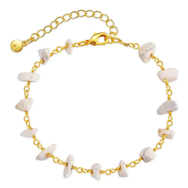 Geometric 18K copper women's bracelet with crystal details and a natural gravel texture, shown in multiple colour options.