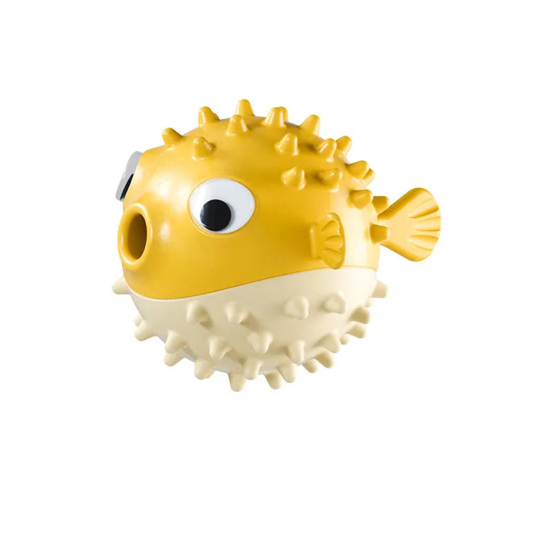 TPR fish-shaped interactive dog chew toy with treat dispensing hole and textured surface
