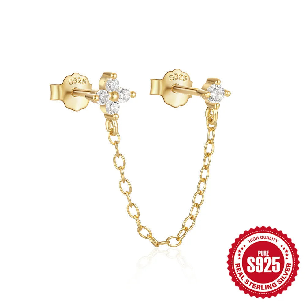 S925 sterling silver stud earrings with a floral motif and dangling gold-coloured tassel chain.
