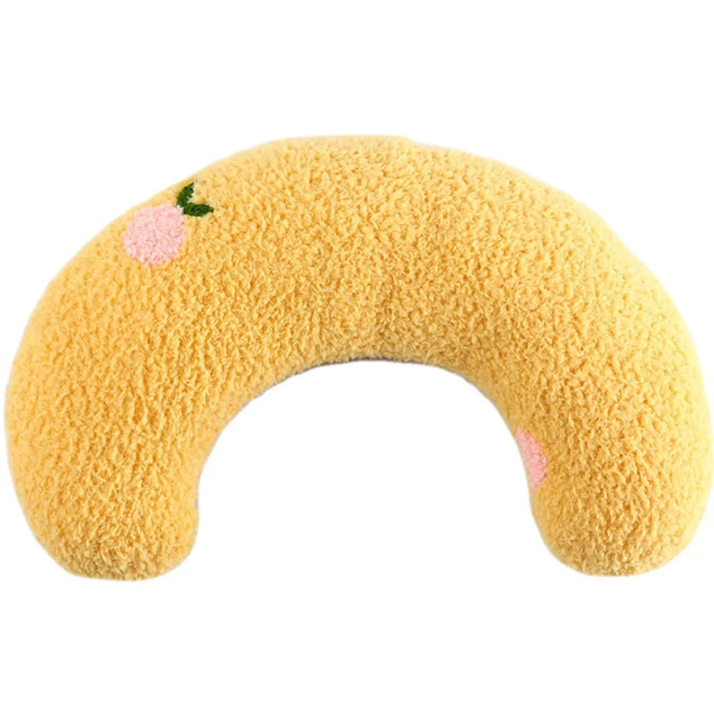 Small half-donut shaped plush pet pillow in blue, showing U-shaped design for cat or small dog neck support.