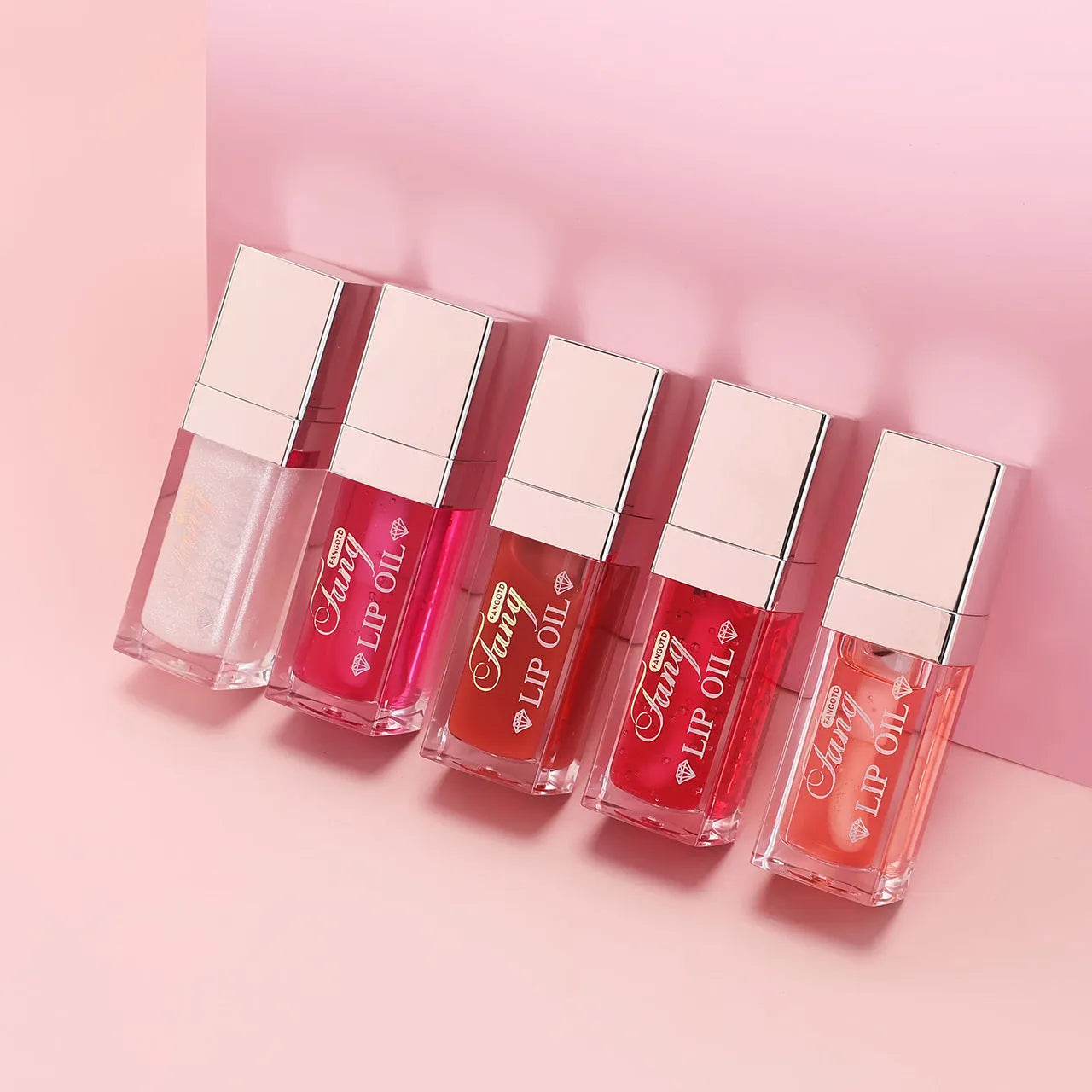 Five colour options of bright lip gloss mint lipstick with moisturising lip essence oil formula