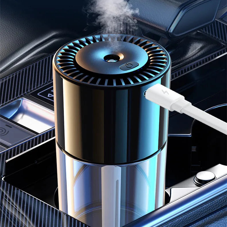 Plug-in USB perfume humidifier with glass seat in Classic Ocean aroma, 12.7cm tall.