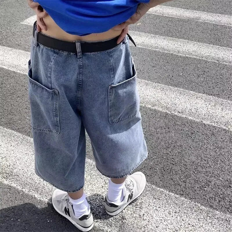 Men's washed light blue denim pirate shorts with a high waist and straight cropped legs on a plain background.