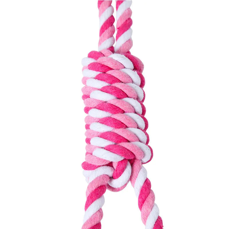 Cotton string dog toy for medium large dogs in red and white colours, approximately 38cm long.