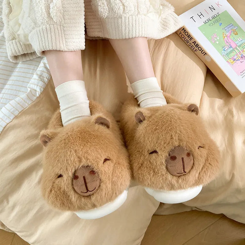 Light brown women's winter slippers with plush upper, artificial wool lining, and PVC sewn soles