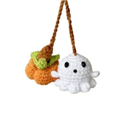 Plush hand-woven polyester automobile hanging ornament with cartoon style design on car dashboard