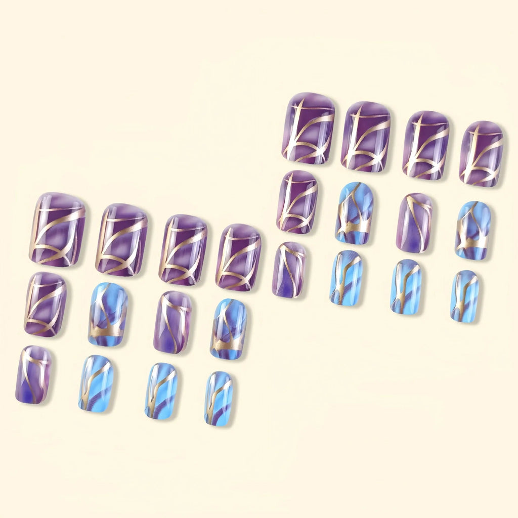 Mid-length purple and white striped nail art stickers on a nail.