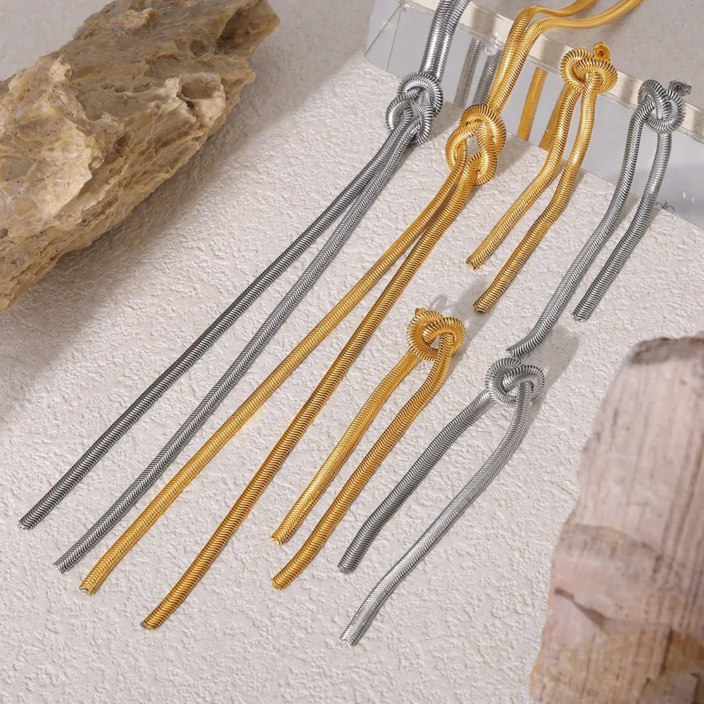 Gold knotted tassel necklace and matching earrings set with snake chain